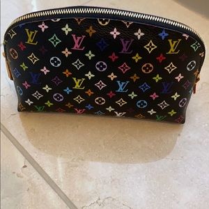 Multi color black Louis Vuitton pouch.